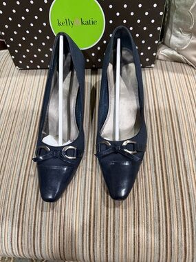 Kelly & Katie Navy Pointed Toe Pump with Bow and Metal Accent